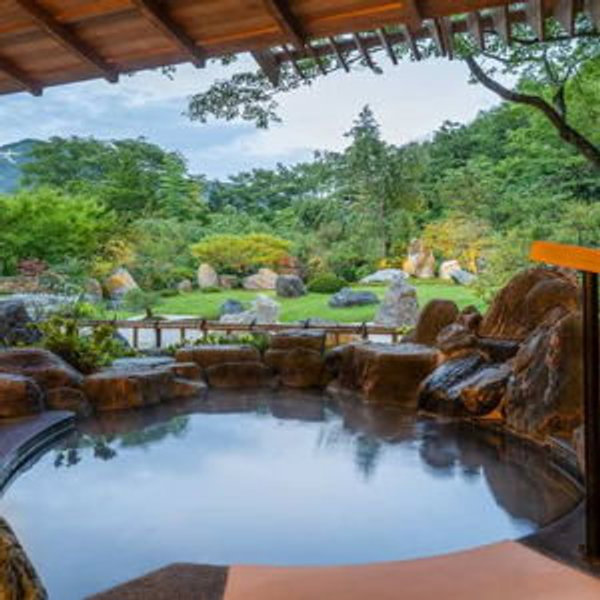 Onsen overlooking a Japanese garden